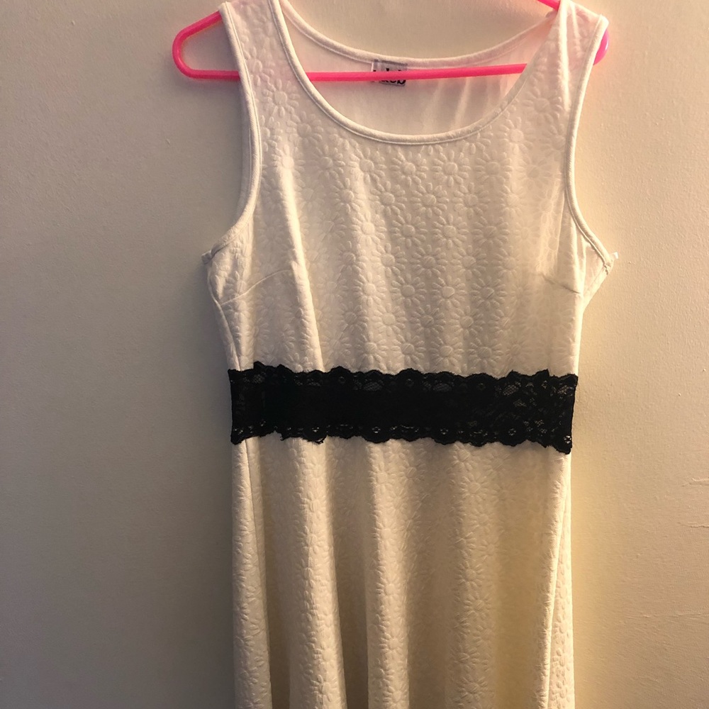 White dress with lace waistline